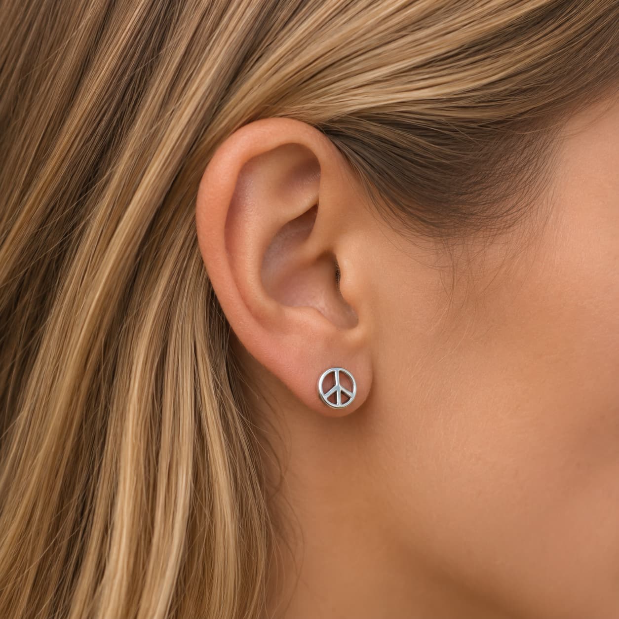 Boucle d'oreille Peace acier inox spécial casque de moto