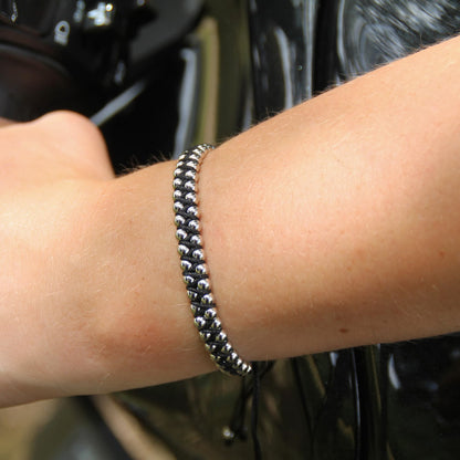 Bracelet ajustable double roulement à billes couleur argent.