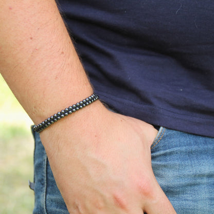 Bracelet double roulement à billes noir.