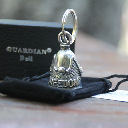 clochette moto Guardian Bell Motard Libre officielle sur sa pochette velours