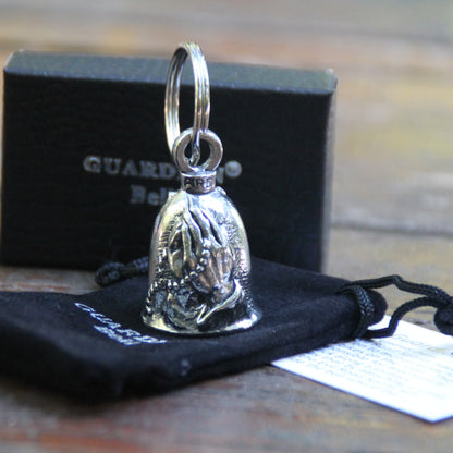 Guardian Bell Mains en prière, mains jointes et chapelet avec croix, en étain avec sa pochette en velours noir et sa carte de la légende