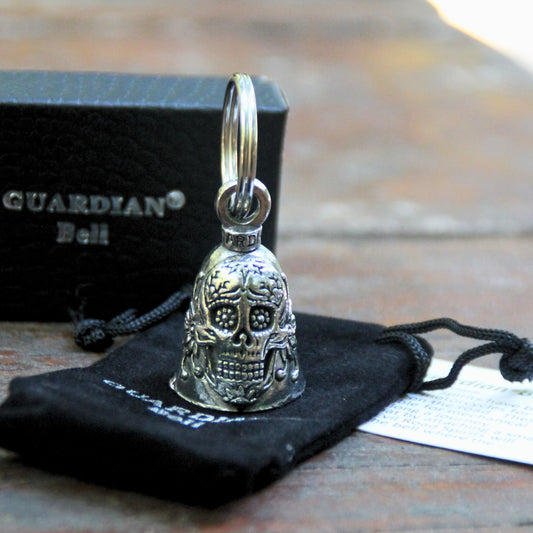 Clochette moto Guardian Bell tête de mort mexicaine officielle sur sa pochette velours noire