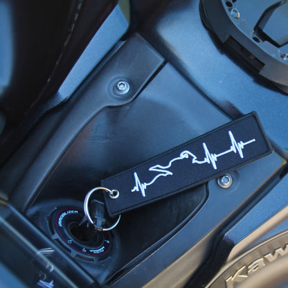 Porte clé moto ligne de vie blanc avec clé sur contact