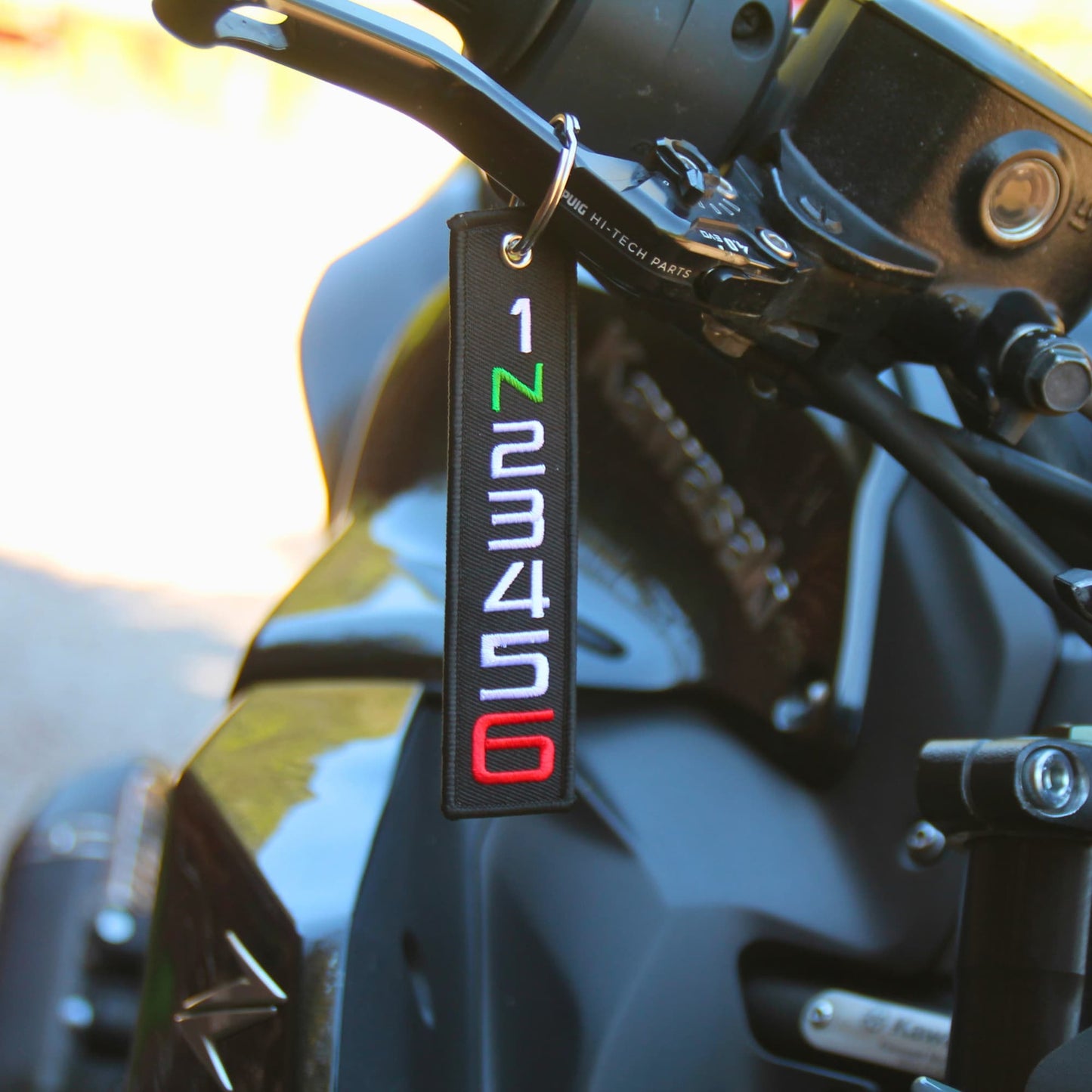 Porte clé motard tissu vitesses moto suspendu levier de frein