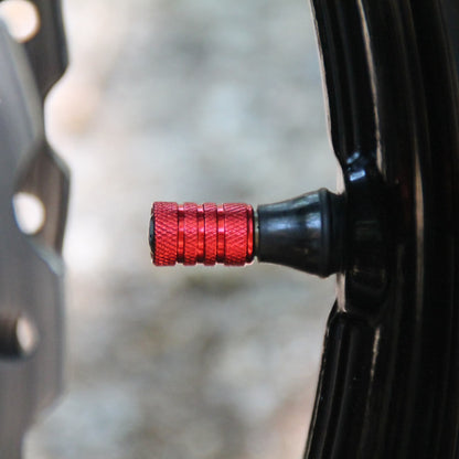 Profile des Bouchons de valve moto rouges et crâne. 